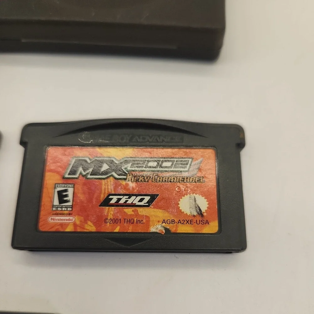 MX 2002 - Nintendo Game Boy Advance SpongeBob Shaun Palmers 2 cases lot of 3